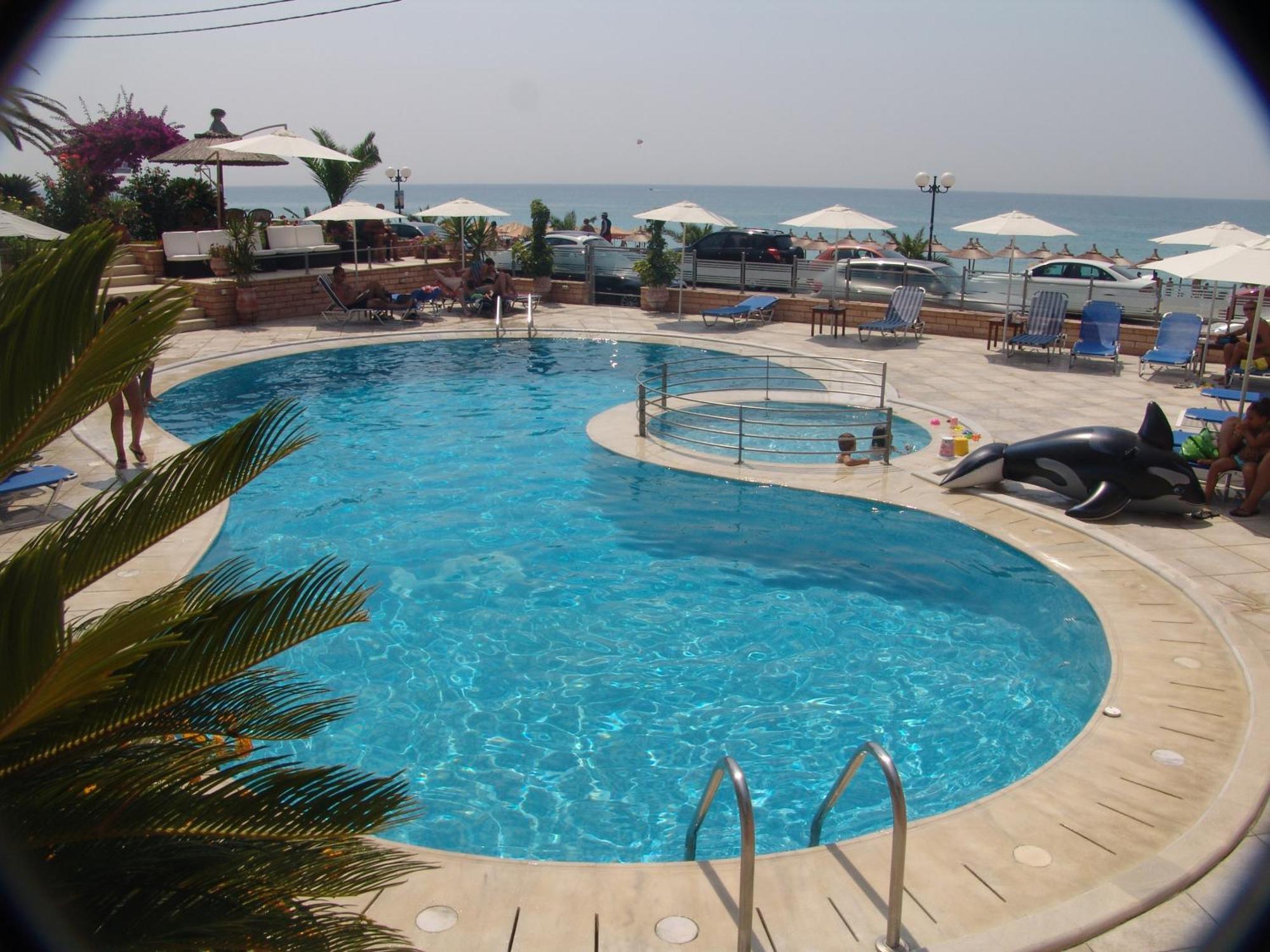 Haris Hotel Apartments And Suites Paralia Vrachou Exterior foto