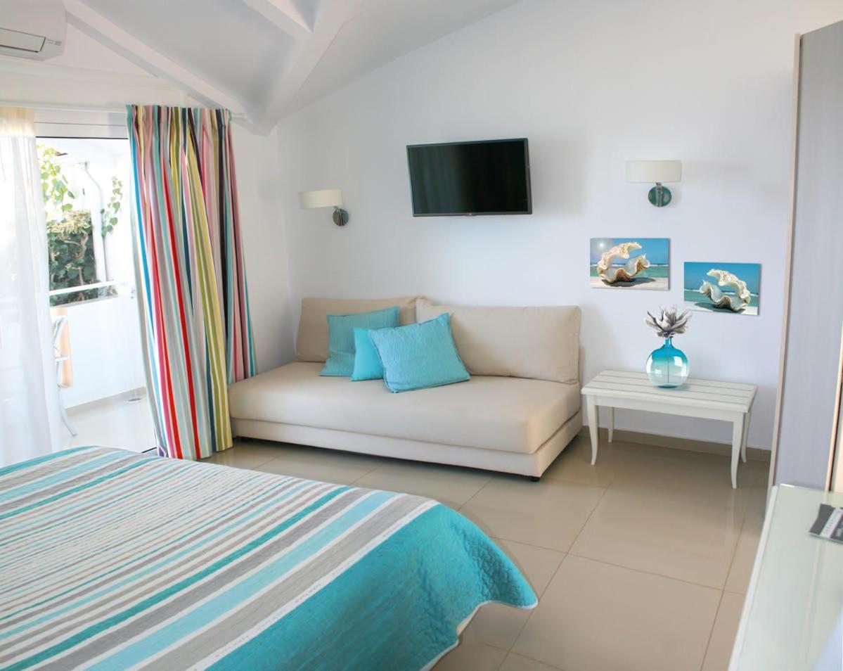 Haris Hotel Apartments And Suites Paralia Vrachou Exterior foto