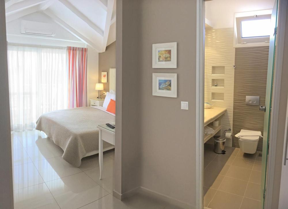 Haris Hotel Apartments And Suites Paralia Vrachou Exterior foto