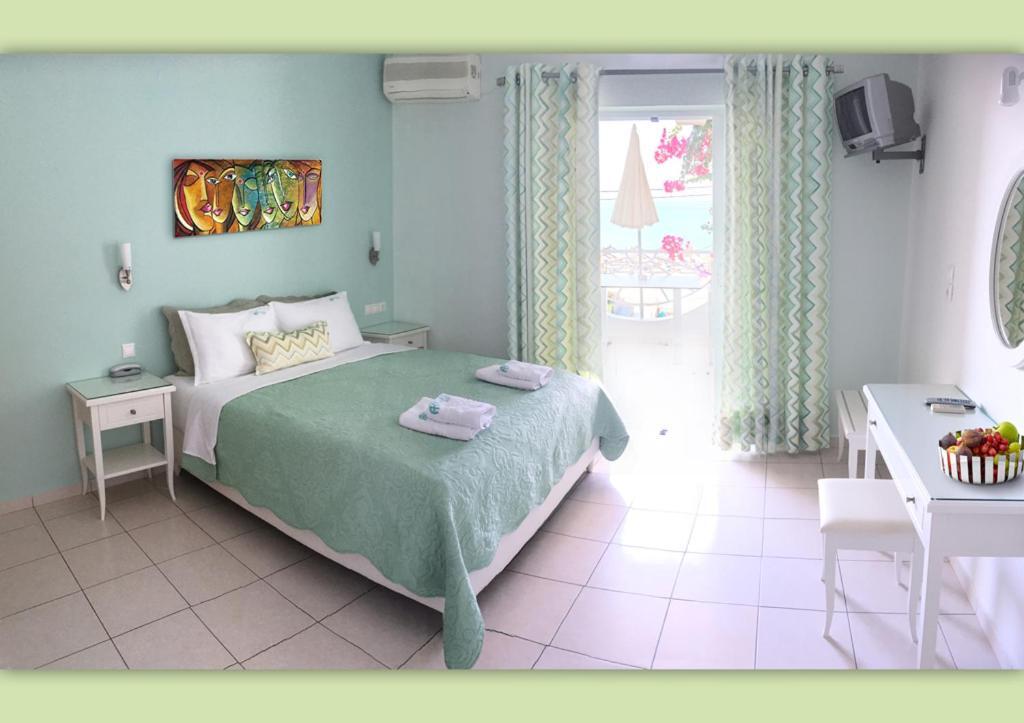 Haris Hotel Apartments And Suites Paralia Vrachou Exterior foto